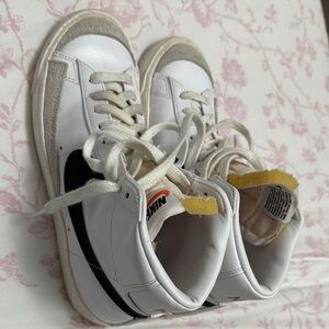 Nike Women’s White and Black High-Top Sneakers